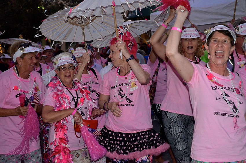 Members of the Hope Afloat paddling team show off their pink pride.