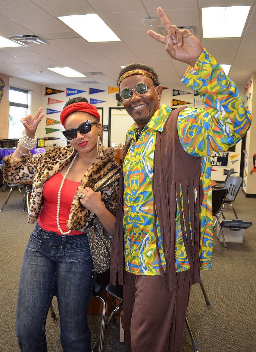 Johnequeva Brice and Post Secondary Adviser Lem Andrews dress up for Booker High School Homecoming week.