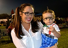 Bailey Pickett and her son, Liam, wear matching costumes.