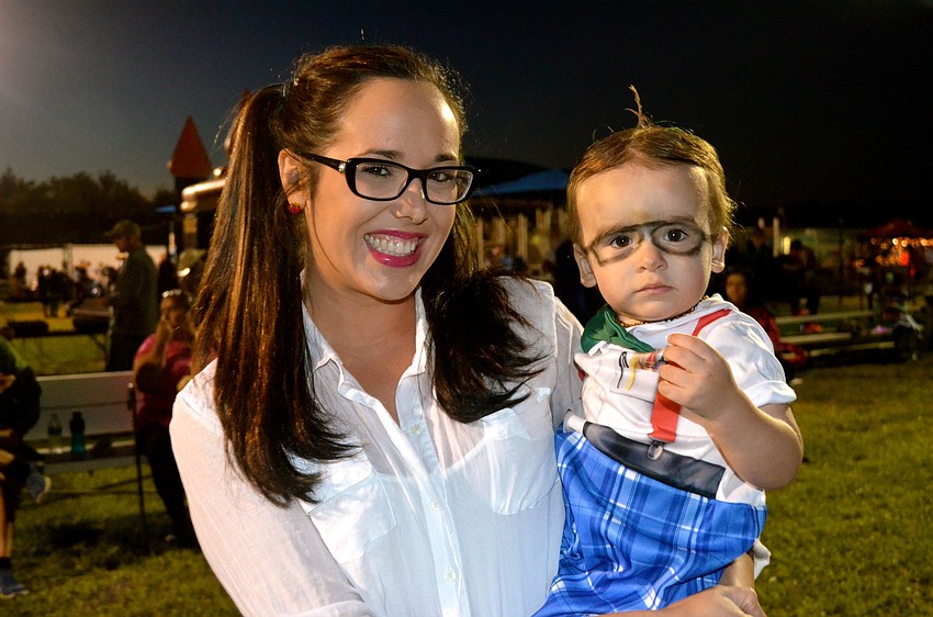 Bailey Pickett and her son, Liam, wear matching costumes.