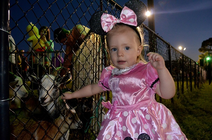 Natalya Kohn is cautious about the animals in the petting zoo.