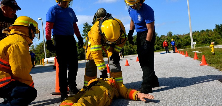 Nic Hotsenpiller must carry a dead-weight dummy to the finish line.