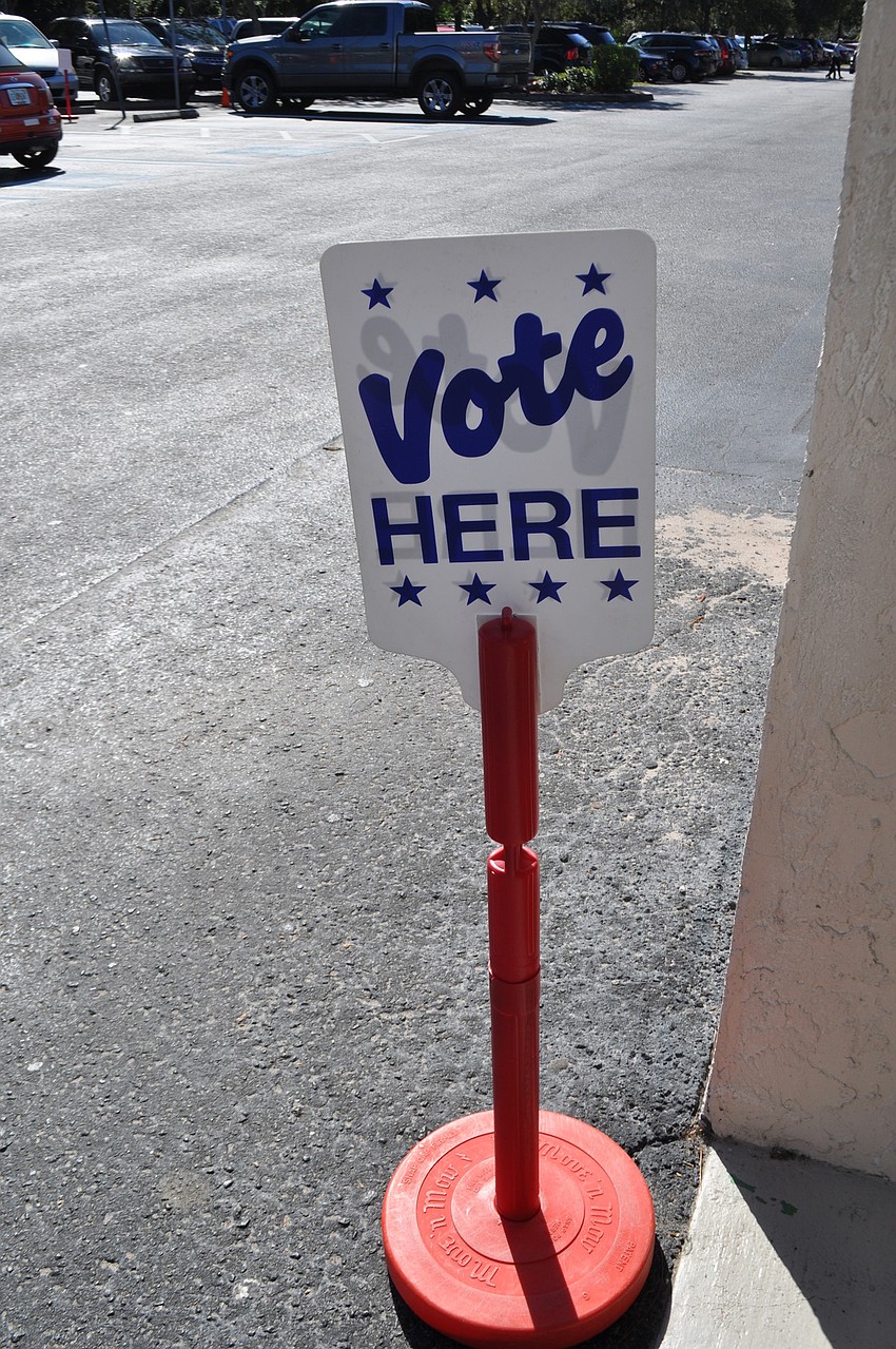 Signs outside Woodland The Community Church encourage people to vote.