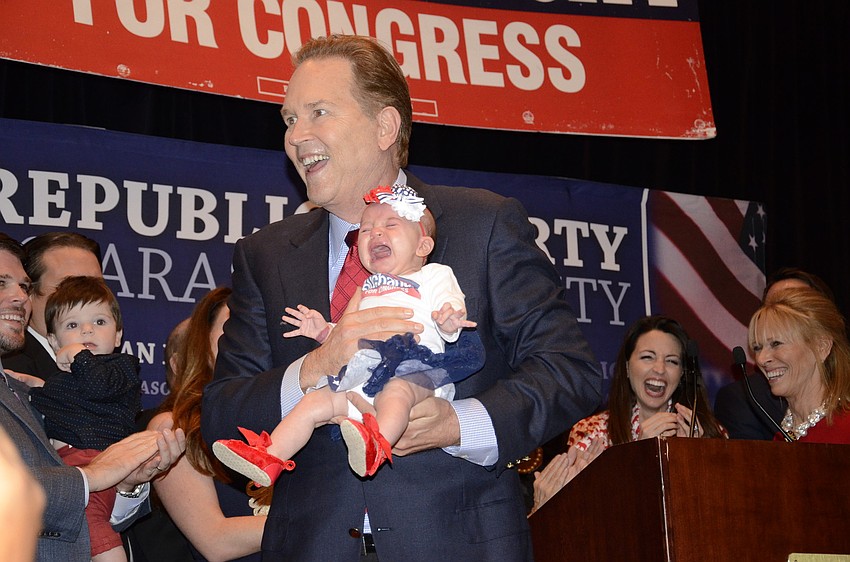 Vern Buchanan landed the District 16 U.S. congressional representative seat with 60.67% of votes. He showed off his granddaughter Lilly to the Republican Party of Sarasota at the Hyatt Regency.