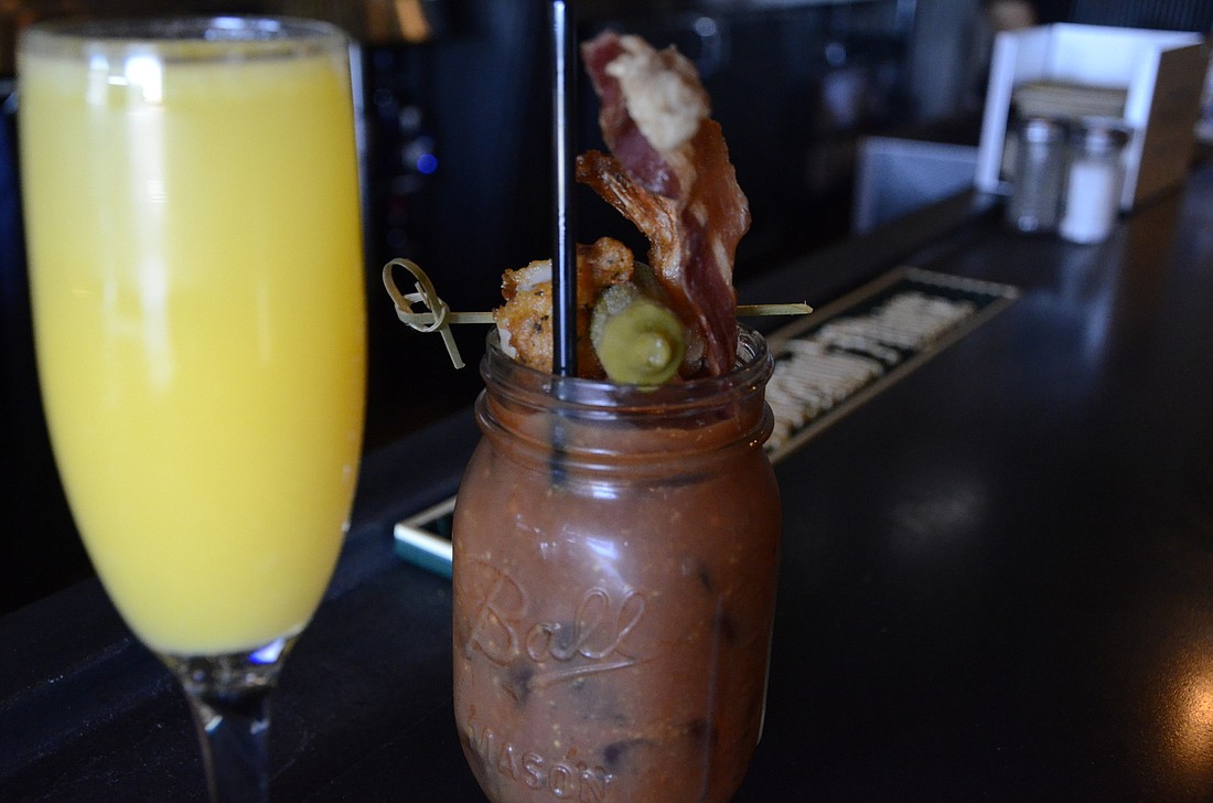 Stacey Rhoads, a bartender at Blue Rooster, said sheÃ¢â‚¬â„¢s gotten lots of surprised reactions from tourists who want to order a mimosa or bloody Mary with Sunday brunch Ã¢â‚¬â€ only to find out they canÃ¢â‚¬â„¢t before noon.