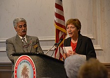 Anthony Sawyer presented outgoing County Commissioner, Nora Patterson with a bouquet at the Republican Womenâ€™s Club of Sarasota Luncheon.