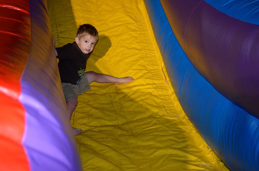 Ryan Rothhaar zips down the slide.
