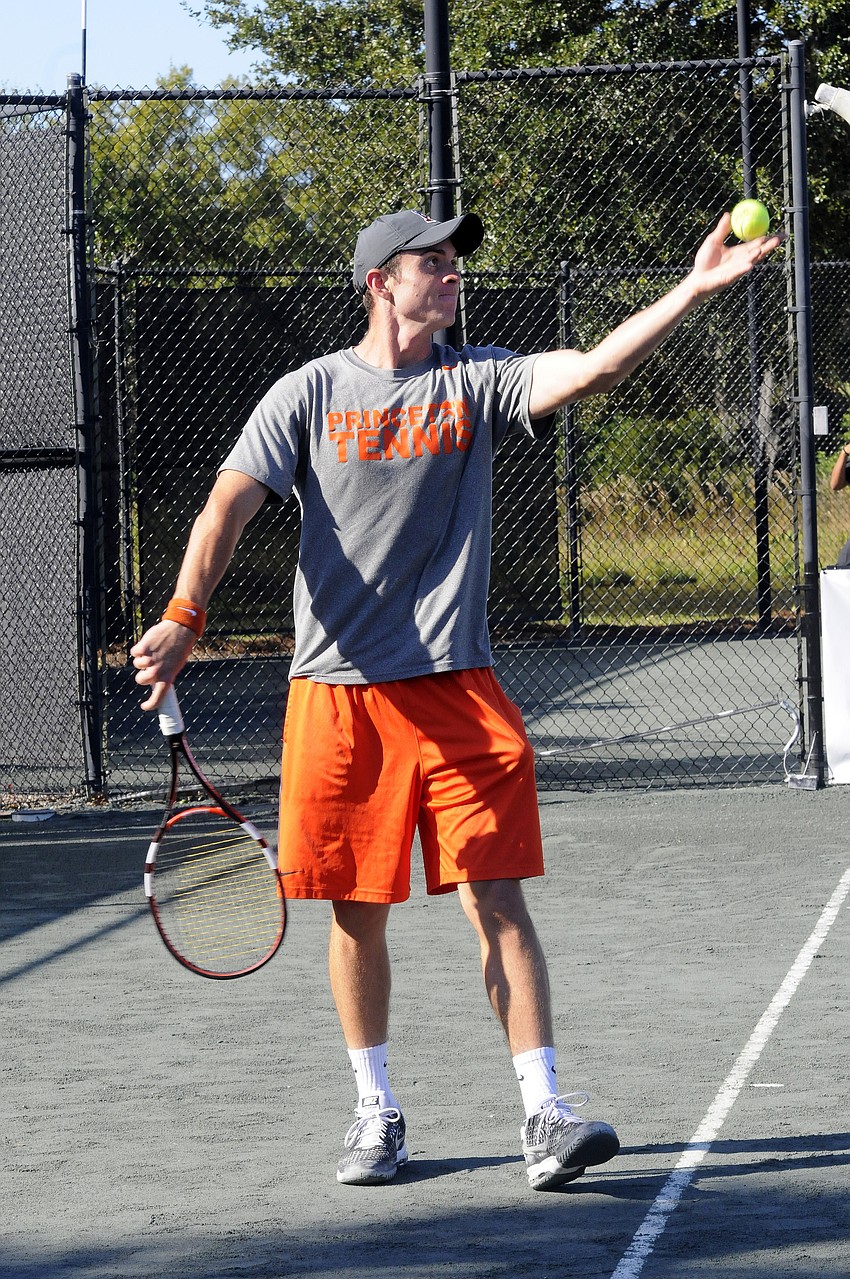 Princeton Universityâ€™s Thomas Colautti prepares to serve the ball during his doubles match versus Florida Gulf Coast University.