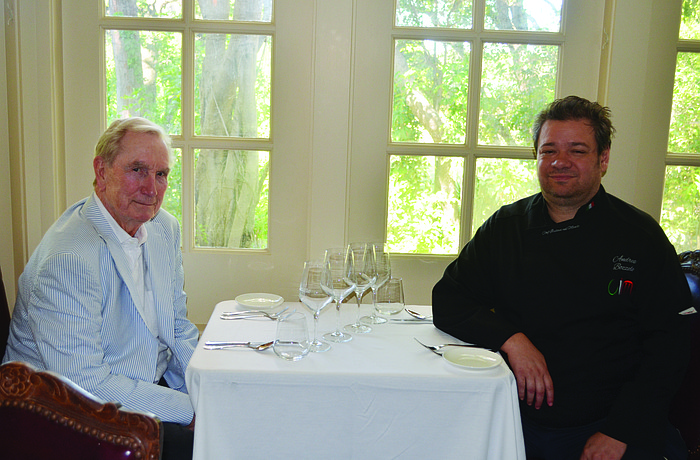 Amore by Andrea proprietors W. Howard Rooks and Andrea Bozzolo. Inset: The interior restaurant seats 210 and includes a bar, formal dining area and basement. Photos by Robin Hartill