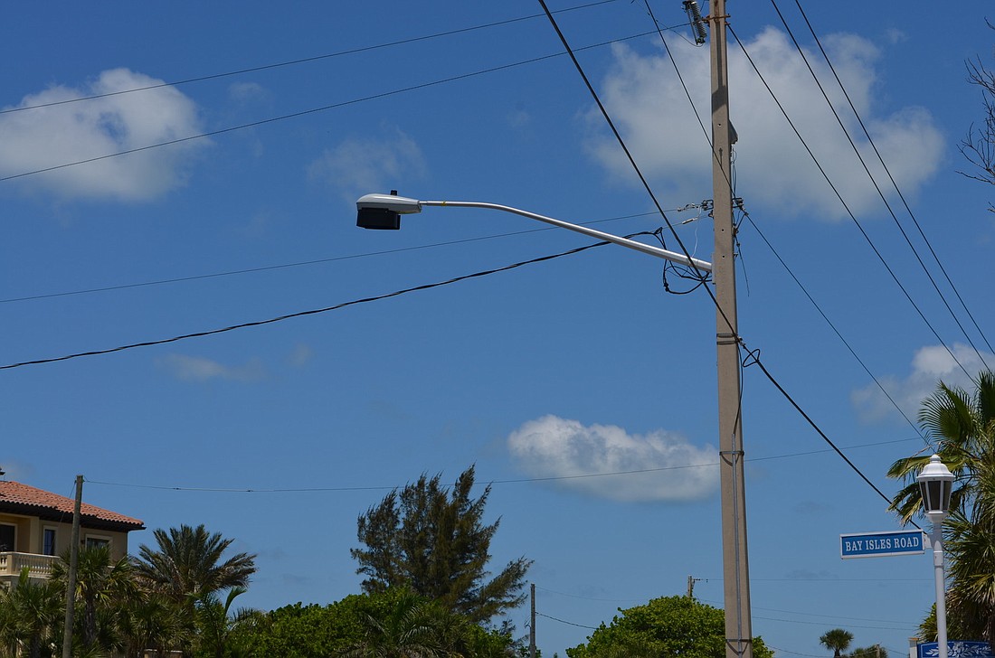 The majority of the commission wants to know what that the cost would be island-wide to bury utilities.