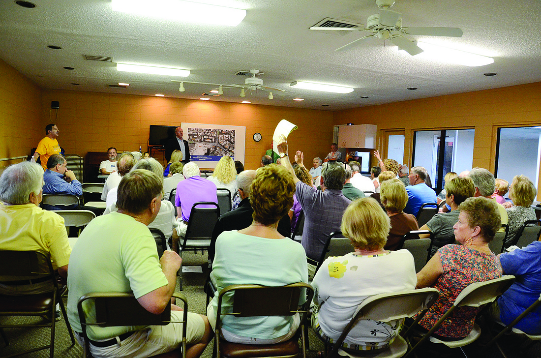 Siesta Key residents ask questions after the Florida Department of TransportationÃ¢â‚¬â„¢s presentation on the future of the intersection of Beach Road and Midnight Pass. Photo by Jessica Salmond