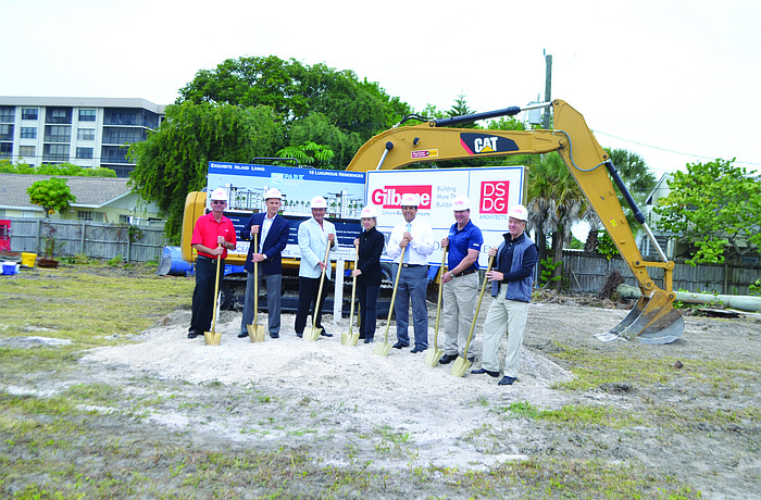 Michael Beaumier, of Gilbane Building Co., co-developers Patrick DiPinto, and David Hargreaves, attorney Brenda Patten, Mark Sultana of DSDG Architects, Tim Helsey, of Gilbane Building Co. and Tom Denslaw, of DSDG Architects. Photo by Kristen Herhold
