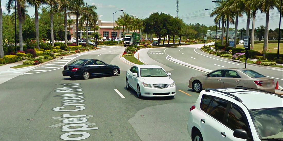 Motorists struggle to get out of each other's way at Cooper Creek Boulevard and Tourist Center Drive. Google Maps