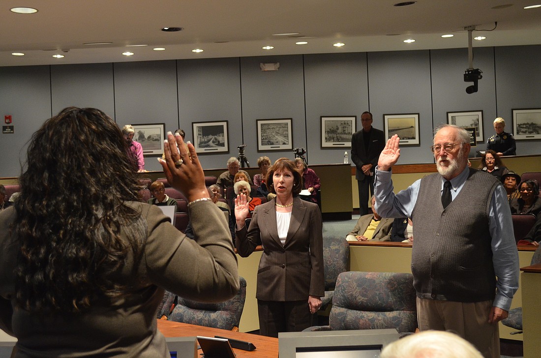 Eileen Normile and Stan Zimmerman are sworn in Wednesday as the newest members of the Sarasota City Commission.