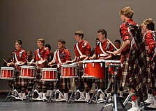 The Riverview High School drum line takes the stage for the â€œSmackdownâ€ portion of the concert.
