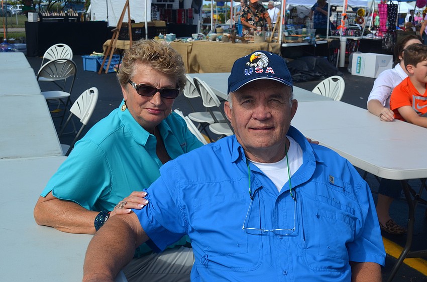 Sharon and Lon Sinness watch the musical performances.