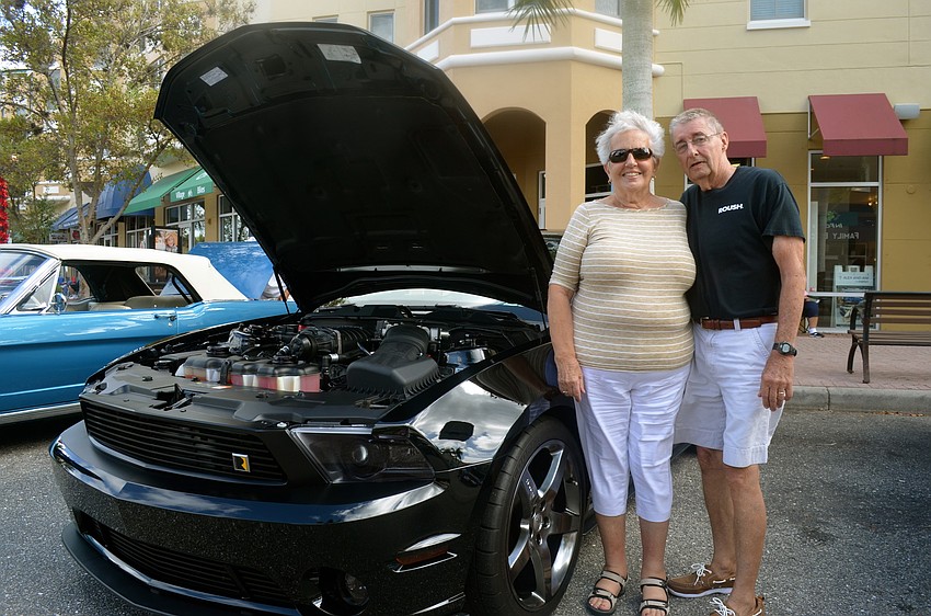 Marcia and Ed Walton show off their 2012 Roush.