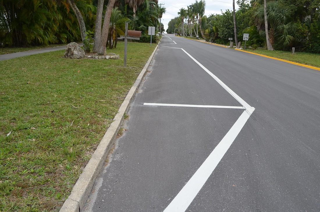 New white parking spaces were painted last week on the south side of Broadway, where parking is permitted.