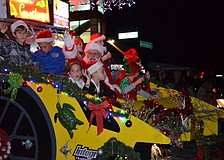 The Light Up The Village parade ended with the arrival of Santa Claus in Siesta Village.