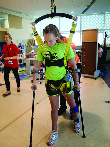 Michelle Donato learns to walk at the Kennedy Krieger Institute in Baltimore.