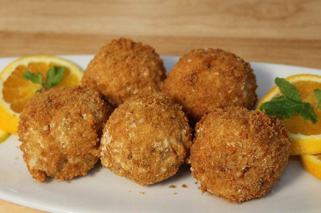 Arancini is risotto cooked in a special Sicilian fashion.