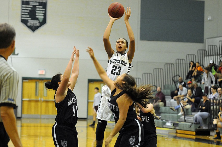 Lakewood Ranch sophomore center LaDhazia Williams finished with 24 points and 10 rebounds in the Lady Mustangs 78-15 victory over rival Braden River Dec. 4.