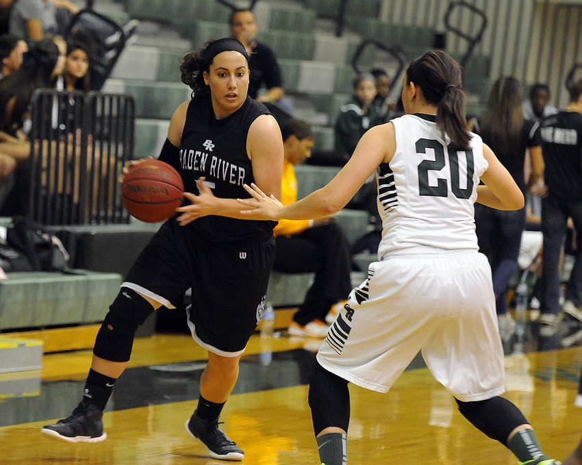 Braden River senior forward Nesreen Ghnaim brings the ball down the court in the first quarter.