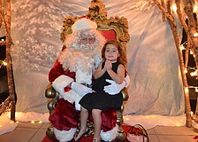 Michela Lombardi, 3, greets Santa