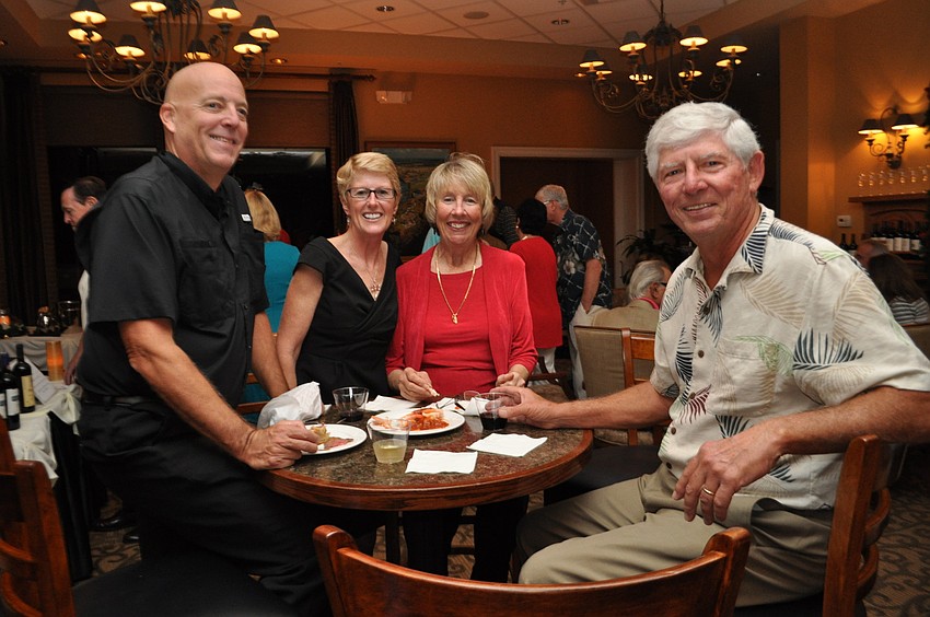 Gary and Kathy Heckman find a table with Crissy and Bill Stasiuk.