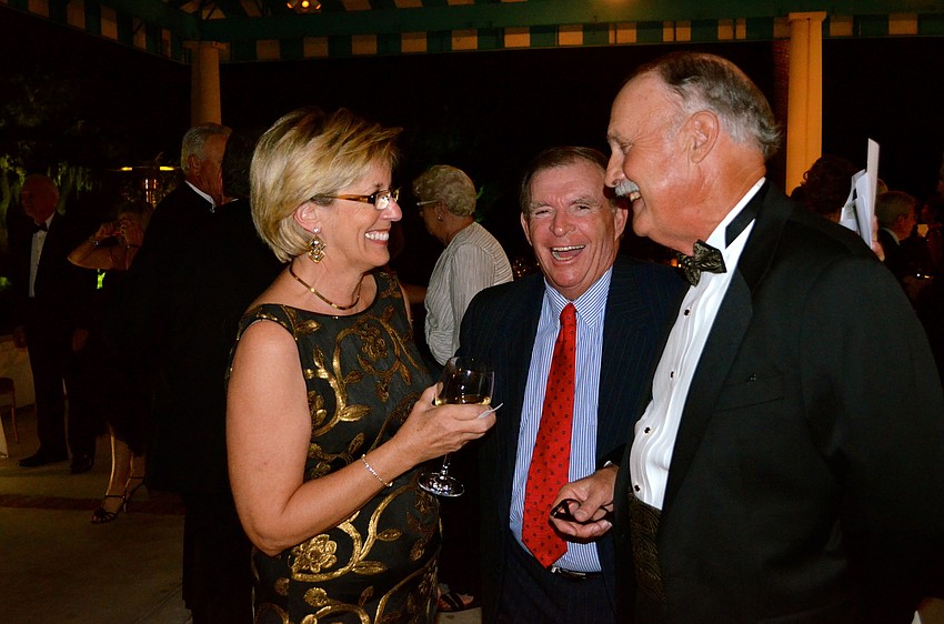 Becky Passanante shares laughs with Dick Crouch and Jim Neale.