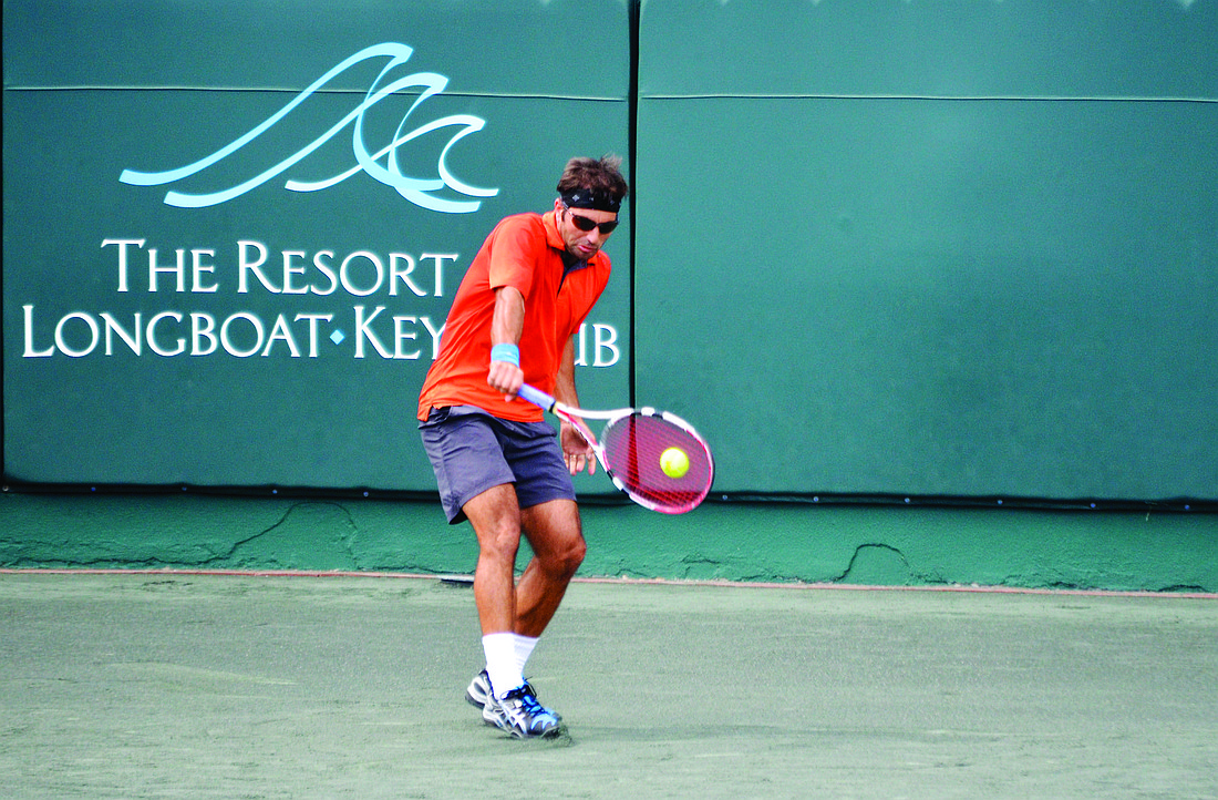 Catalin-Ionut Gard returns a serve during a qualifying-round match at the 2014 Sarasota Open. File photo