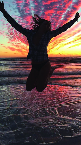 James West submitted this photo of his daughter, Katherine, jumping for joy at sunset on Siesta Key.