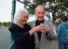 Alice and Wayne Freed cheers to a fun night of tennis.