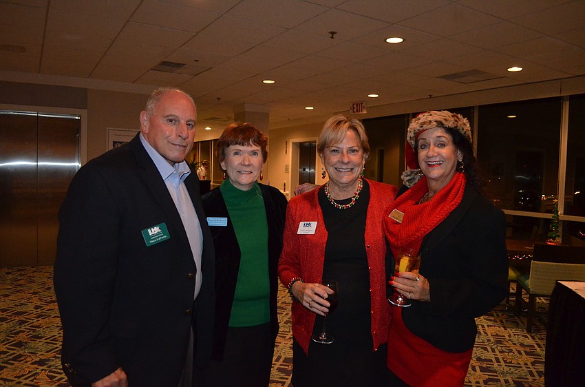 Vince LaPorta, of Longboat Key Club, Nancy Taussig, of Barefoot Weddings, Chamber President Gail Loefgren and Suzanne Stacy, of Suzanneâ€™s â€œJ.A.P.â€ Service