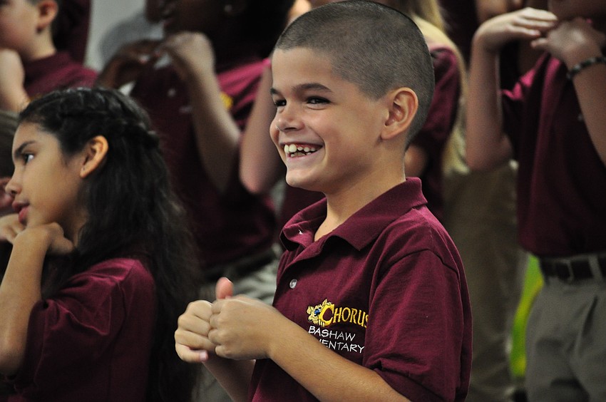Jake Roman, 8, is all smiles during 