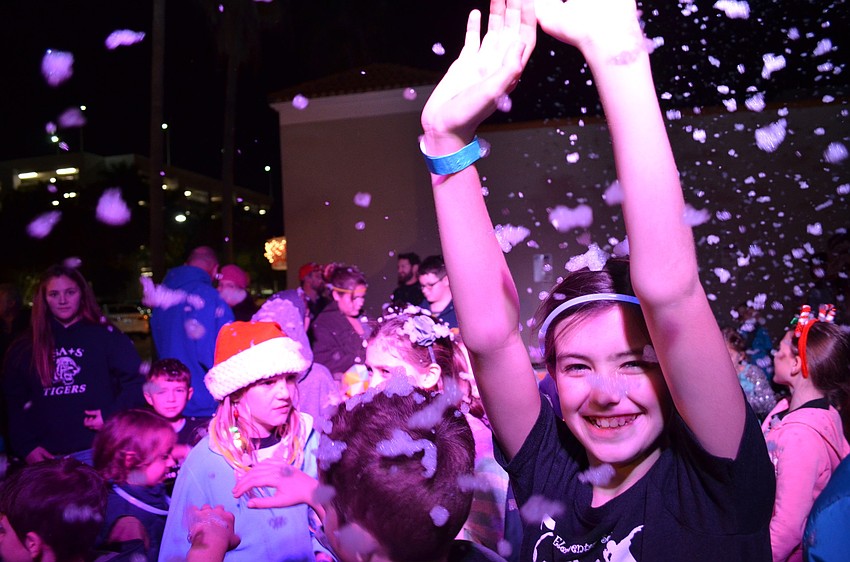 The forecast called for snow at Gecko's Grill and Pub for the Southside Village Holiday Stroll.