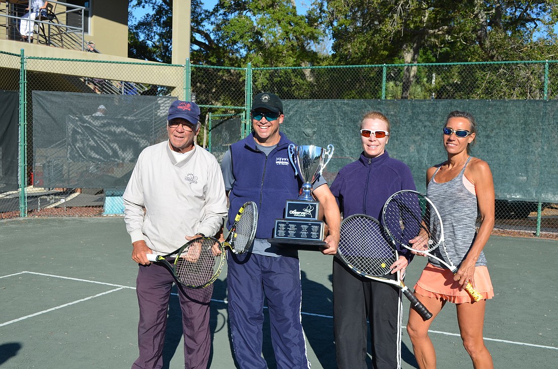 Observer Challenge Division four champions Jim Purcell, Roger Blair, Kristin Beeman and Angie Eason display their trophy.