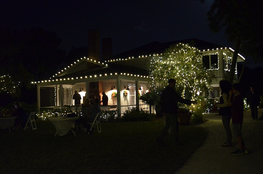 The White Cottage at Historic Spanish Point is decorated for Holly Days and Mangrove Nights.