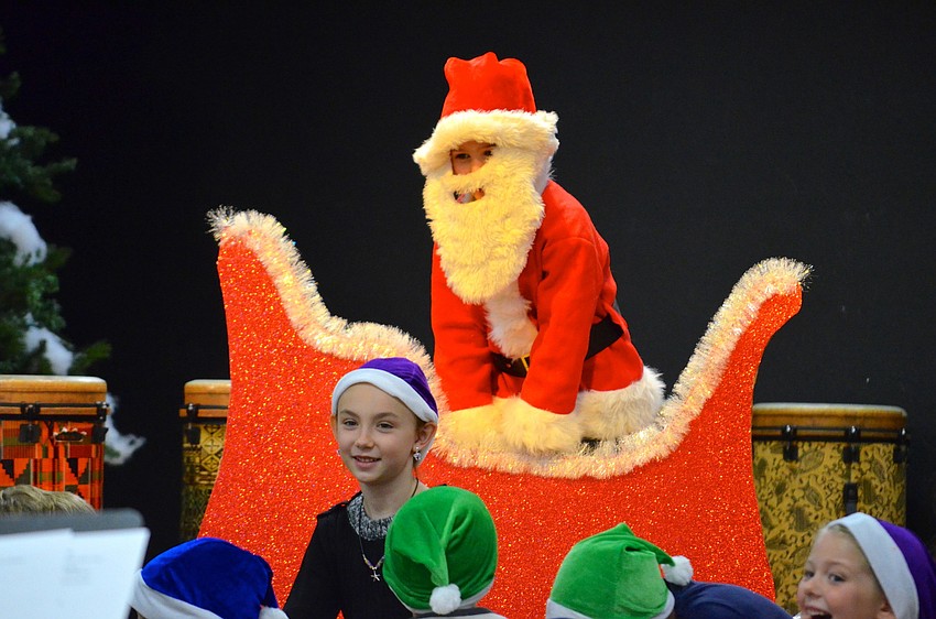Brady Theisen plays Santa and surprises the audience at the end of the production.