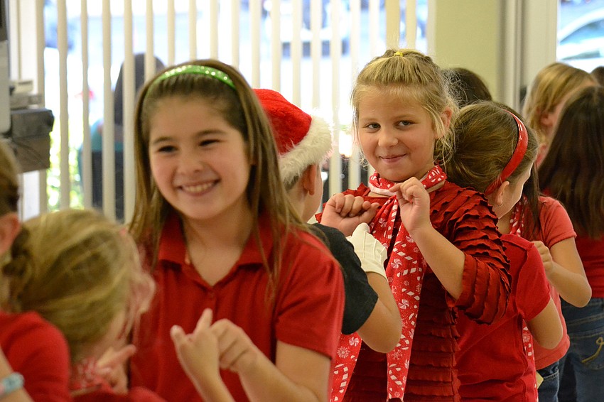Students performed holiday songs for residents at the Jefferson Center.