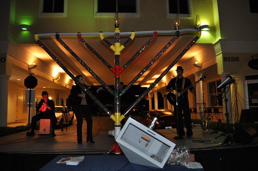 This year's menorah was filled with 90,000 coins.