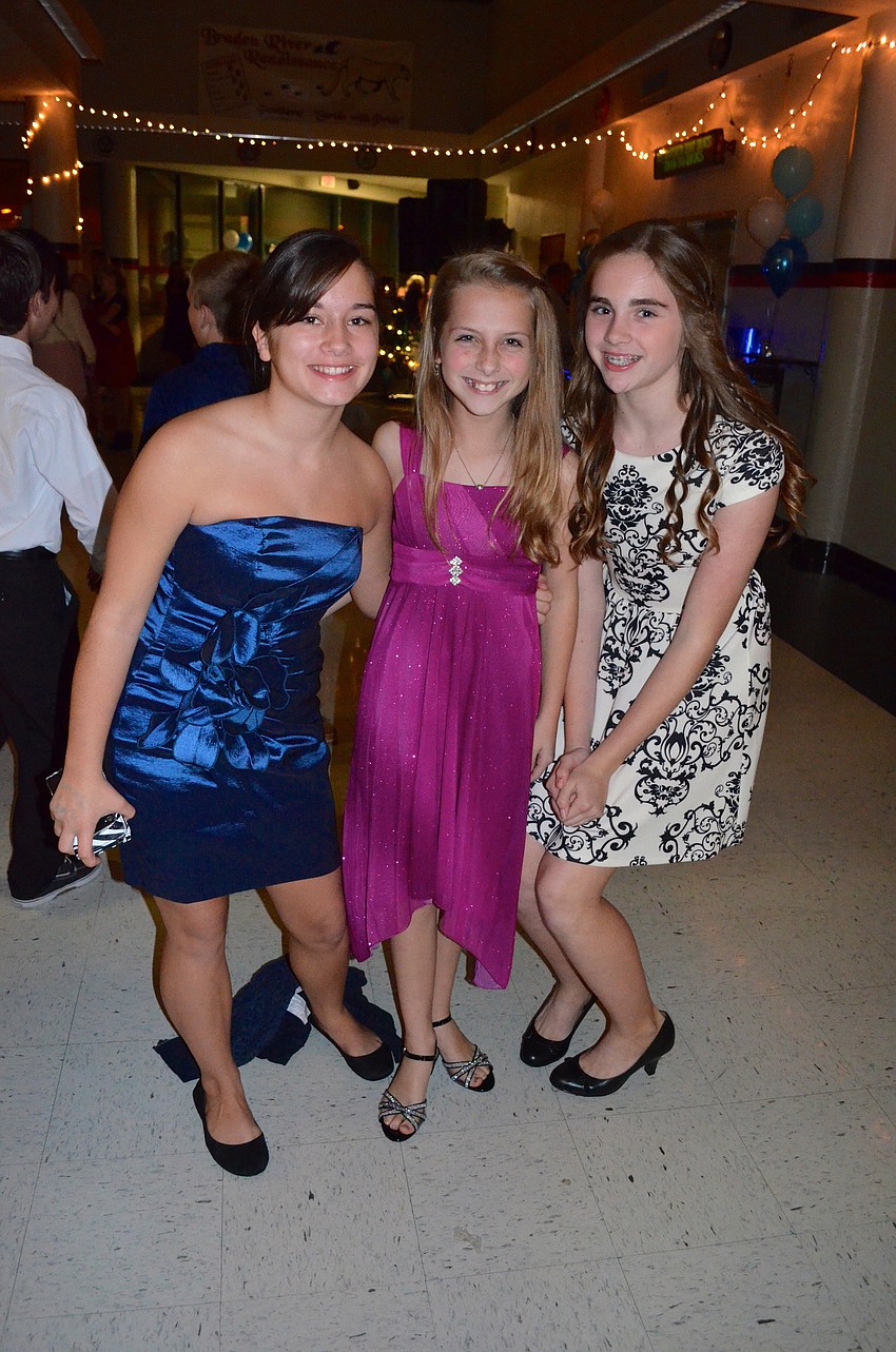 Savrie McNab, Samantha Merigliano andHannah McCurry say 