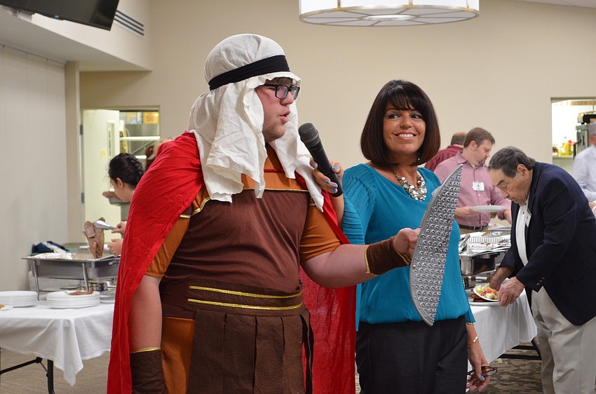 Adam Caldwell tells the story of Judah Maccabee at Hanukkah Happening.