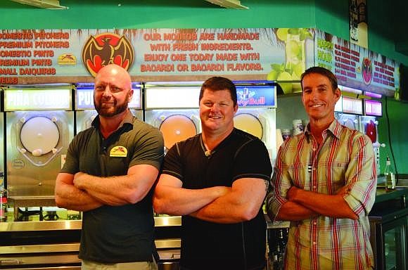 Daiquiri Deck Vice President of Operations Matt Grover, President Troy Syprett and Vice President of Marketing Russell Matthes.