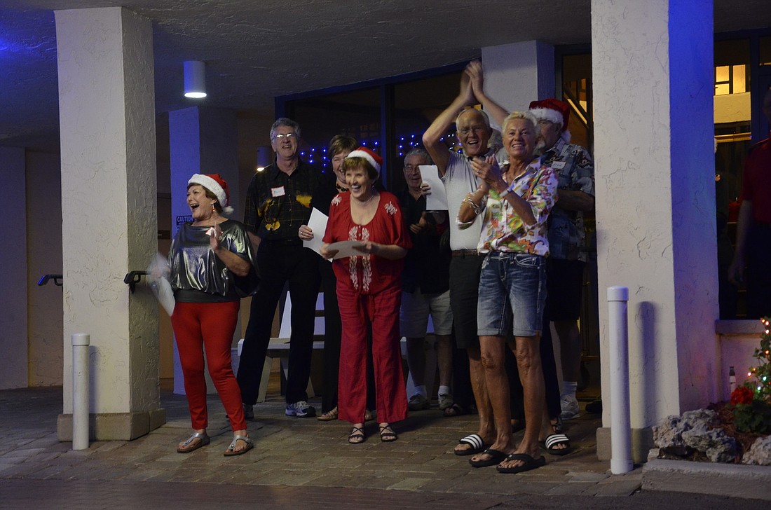 The lighting contests judges were treated with Christmas carolers at Whispering Sands.