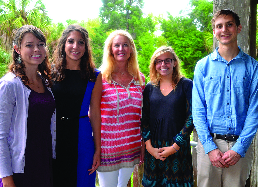 Susan Phillips, center, with Longboat Key Garden Club scholarship recipients, Abigail Oakes, Erika Smith, Isabella Soutullo and Nicolas Scheffer at the group's annual meeting and picnic April 8, at Joan M. Durante Park. 4