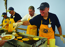 Joe Walsh serves pancakes with a smile at the Kiwanis Club of Longboat Key's annual pancake breakfast March 22, at St. Mary, Star of the Sea, Catholic Church.