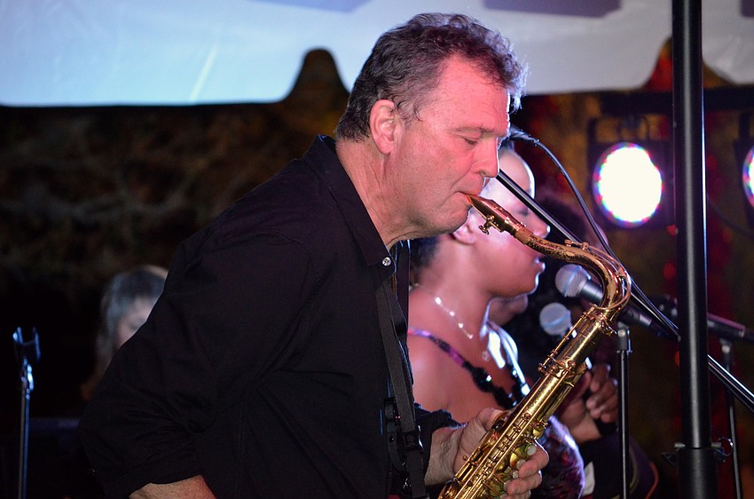 Tom Ellison plays the saxophone for Soul Sensations.