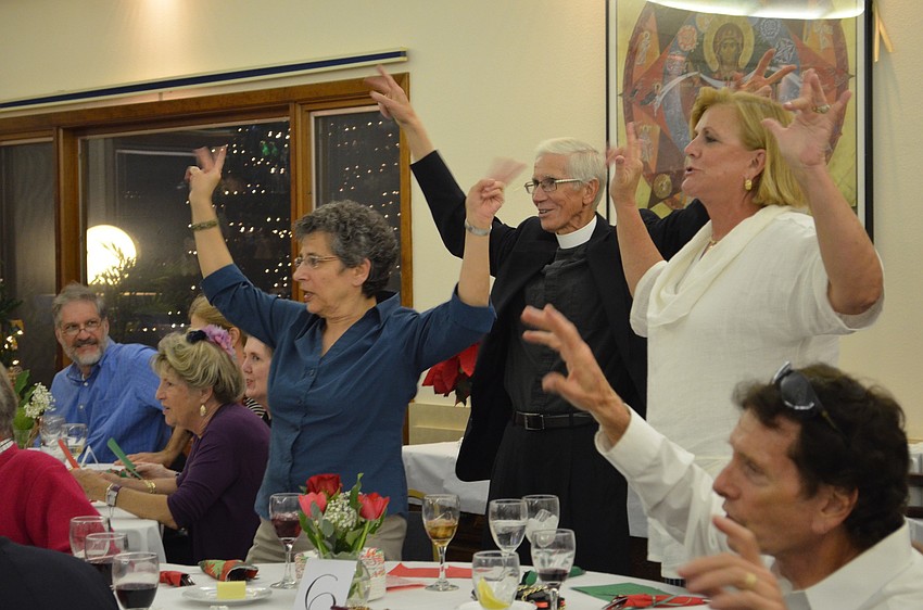 Guests act out the lyrics to â€œThe Twelve Days of Christmasâ€ during the All Angels by the Sea Episcopal Church Cabaret.