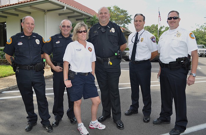 Bob Bourque, John Martin, Sandi Drake, Jeff Morningstar, Fire Chief Paul Dezzi and former Capt. Bill Tokajer